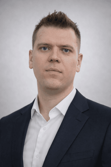 Portrait of Yevhenii Belan, head of telecom partnerships and regional strategy at CHERNOMOR